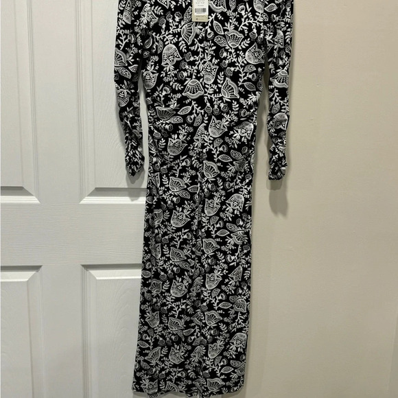 Boden Ruched Jersey
Midi Dress
• Color/pattern: black and ivory, tulip vine - Picture 7 of 9